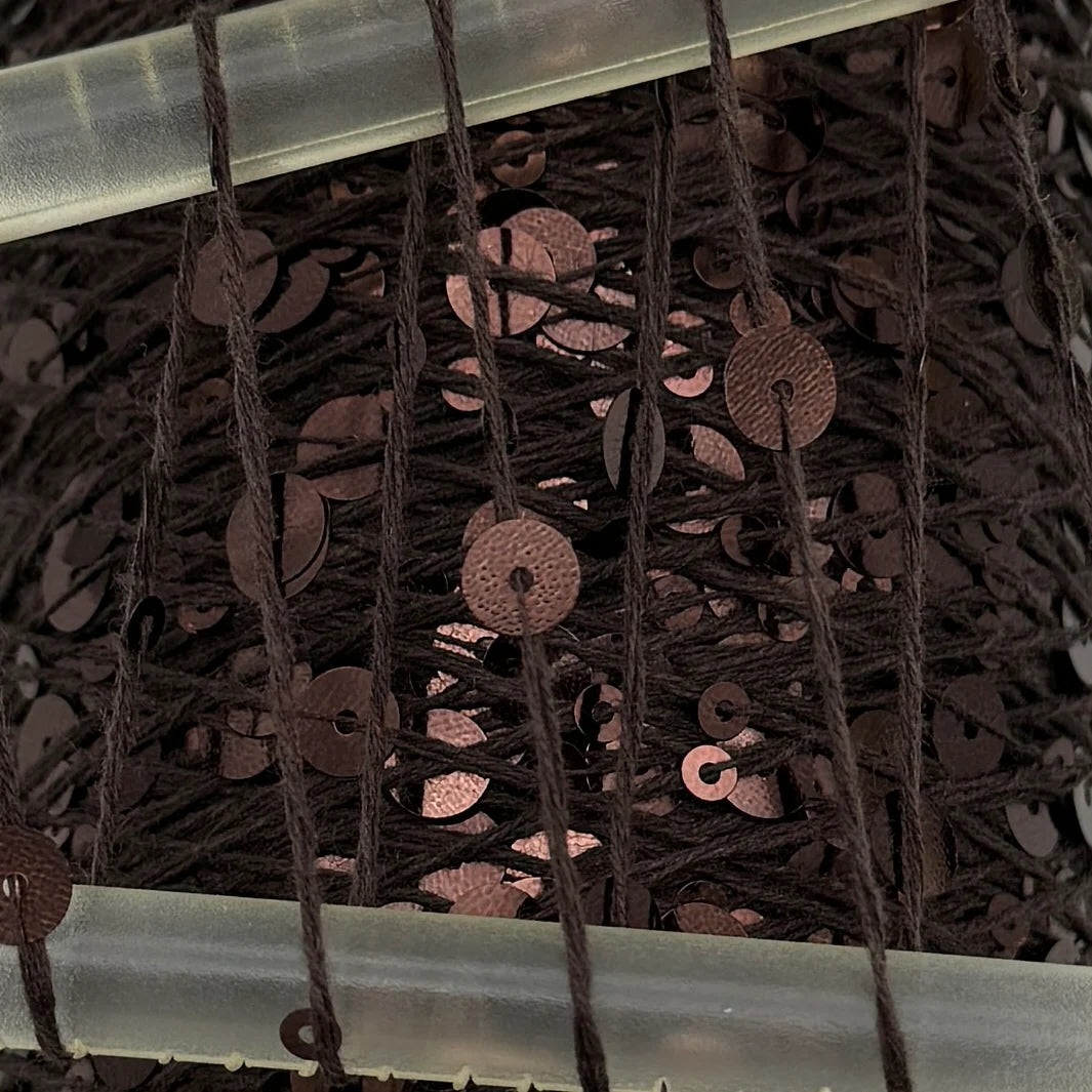 Wolle Halle - Chokolade | Effektgarn med pailetter.